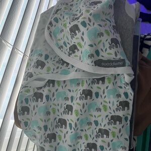 Halo & SwaddleMe and one more brand name swaddles. All brand new- NB 0-3 month